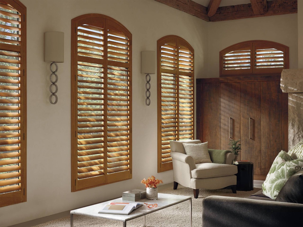 Arched window shutters in a living room near Youngstown, OH